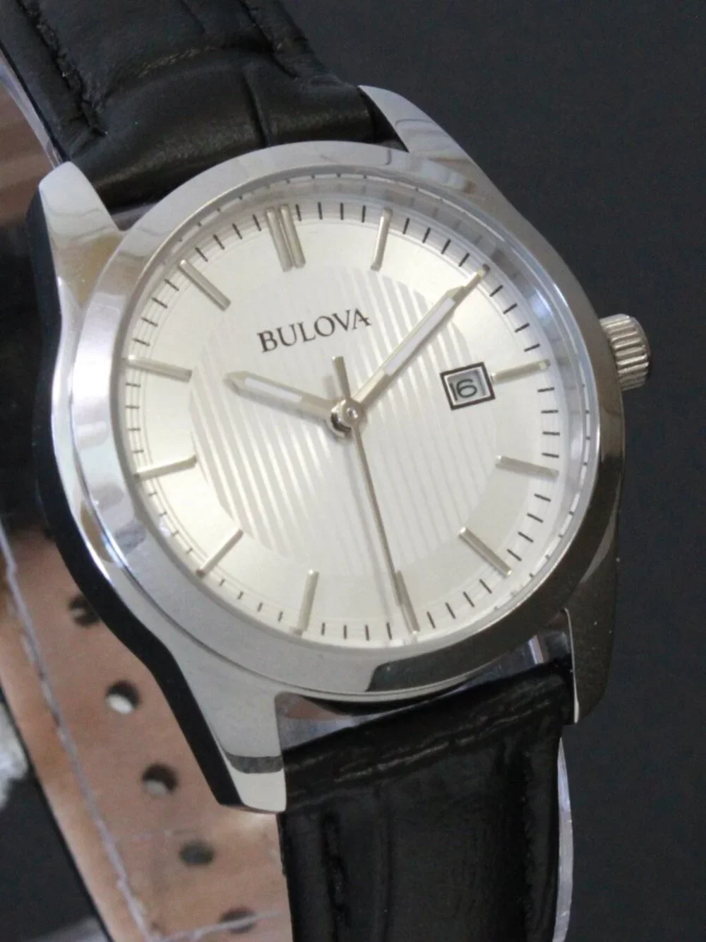 Bulova Ladies Classic Dress Watch Stainless, Silver Textured Dial, Black Strap
